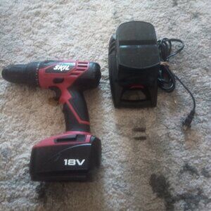 Skil drill with charger 2 batteries and bits